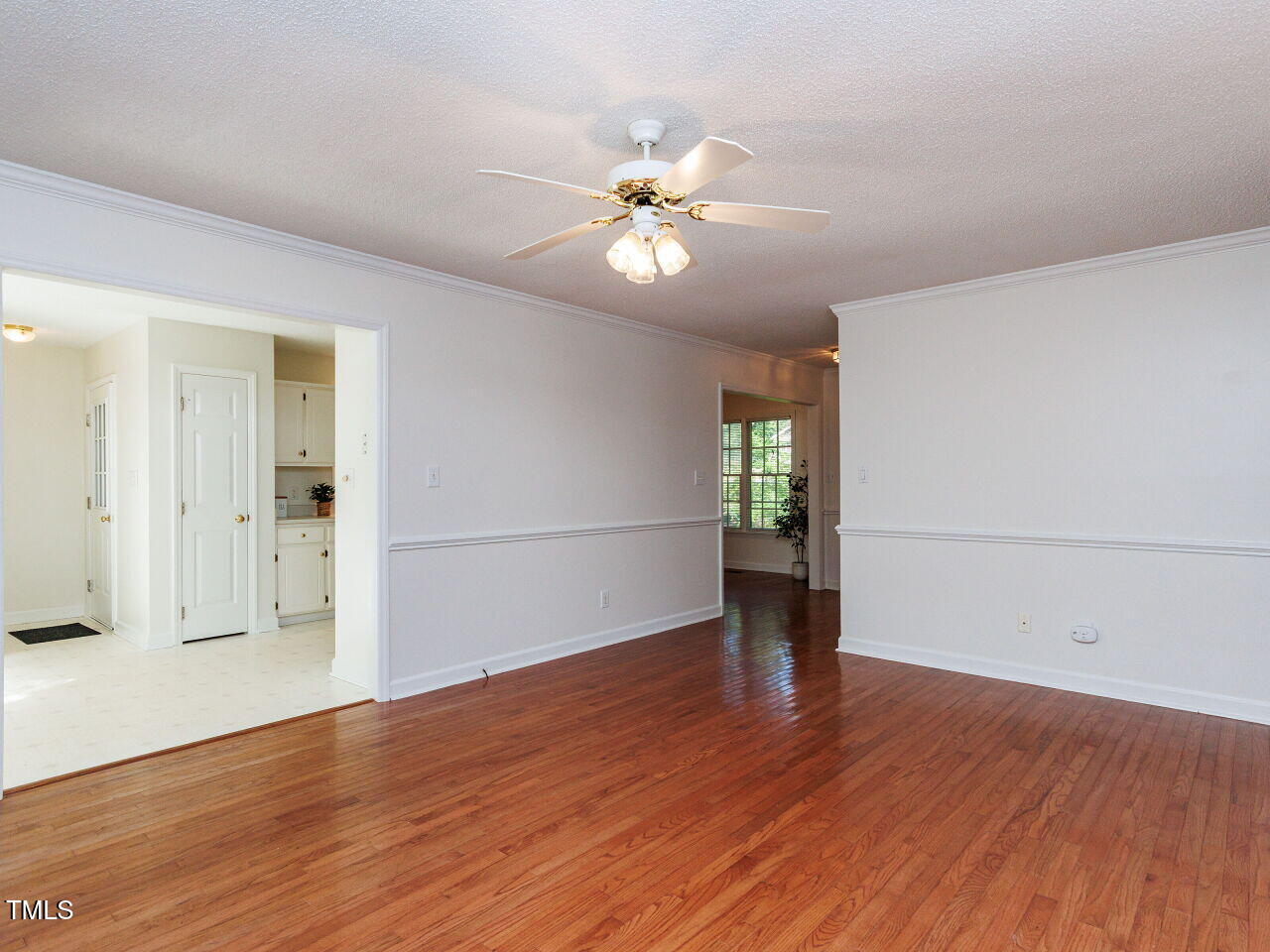 216 Deep Pool Court Benson, NC 27504 - Photo 7 of 37 wooden floor in an empty room with a window