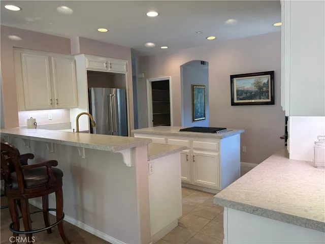 a bathroom with a sink a mirror and a toilet