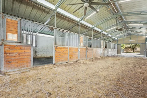 a view of a room with wooden walls