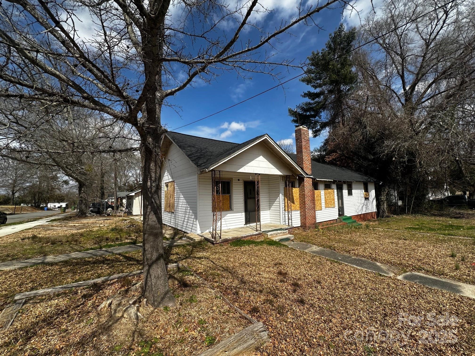 306 East Arch Street Lancaster, SC 29720 - Photo 1 of 4 a front view of a house with a yard