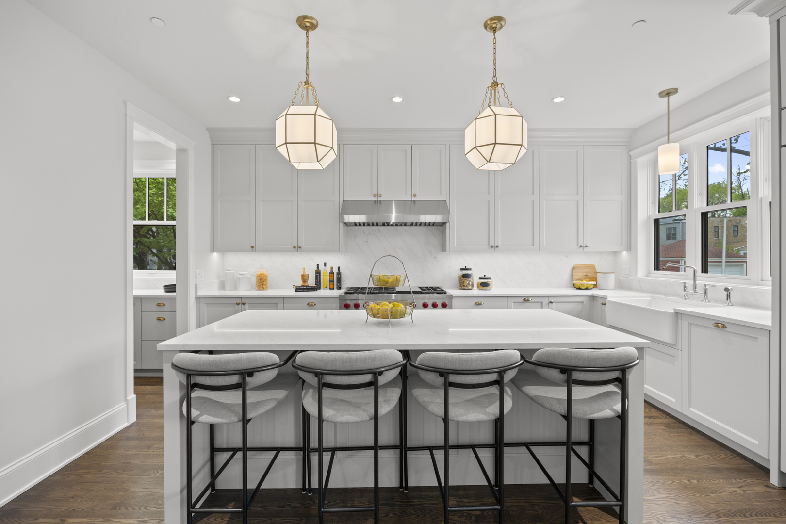 3902 North Hamilton Avenue Chicago, IL 60618 - Photo 15 of 67 a kitchen with a dining table chairs and cabinets