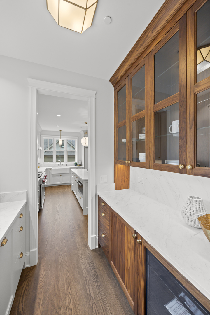 3902 North Hamilton Avenue Chicago, IL 60618 - Photo 22 of 67 a view of a kitchen cabinets and a wooden floor