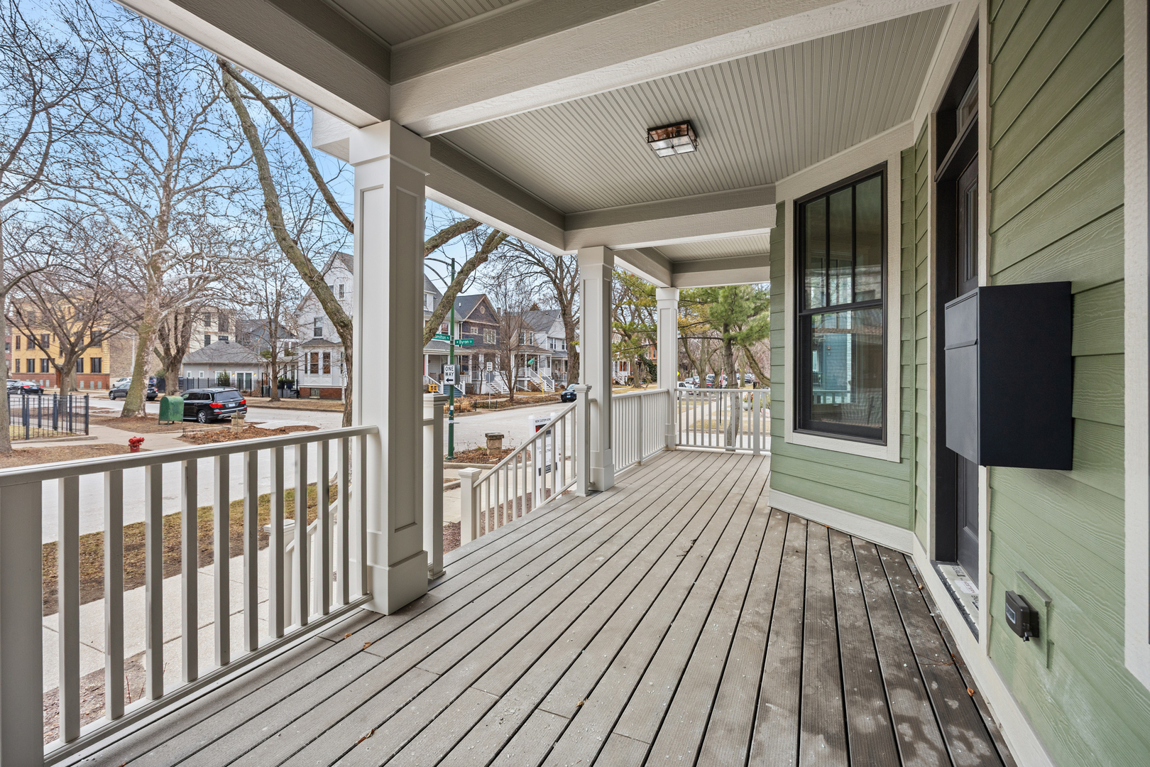 3902 North Hamilton Avenue Chicago, IL 60618 - Photo 3 of 67 a view of a porch with wooden floor and outdoor space