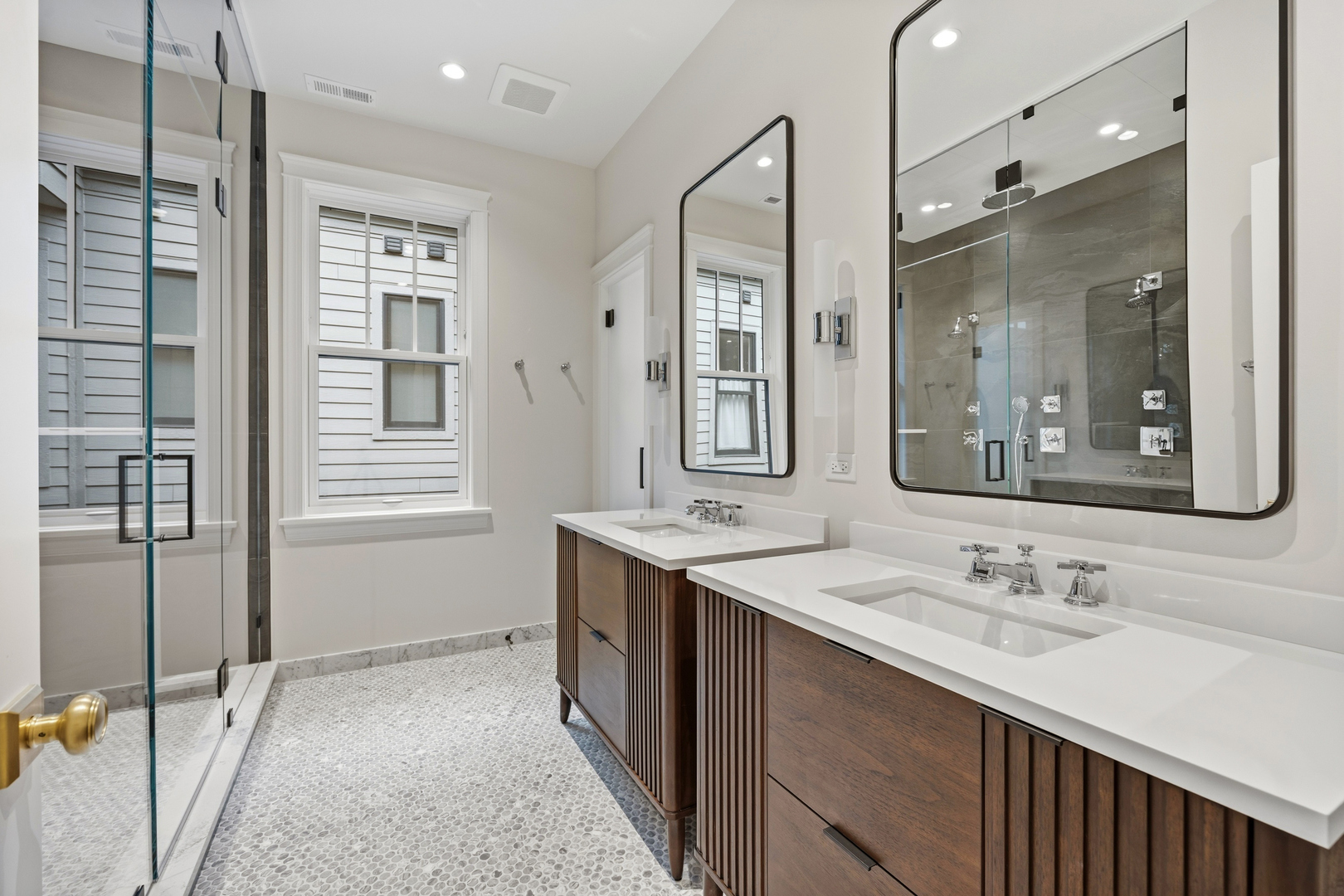 3902 North Hamilton Avenue Chicago, IL 60618 - Photo 45 of 67 a bathroom with a double vanity sink mirror and shower