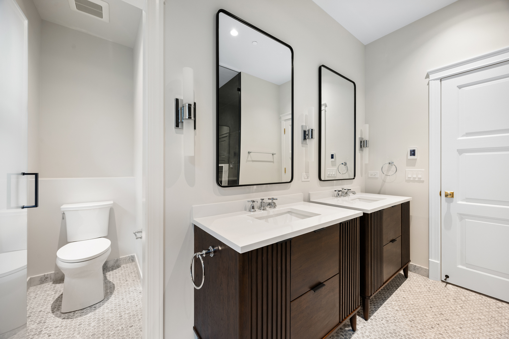 3902 North Hamilton Avenue Chicago, IL 60618 - Photo 46 of 67 a bathroom with a toilet sink and mirror