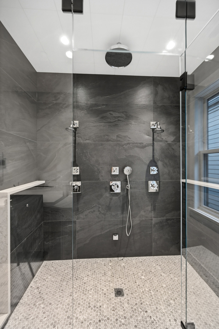 3902 North Hamilton Avenue Chicago, IL 60618 - Photo 47 of 67 a bathroom with a shower