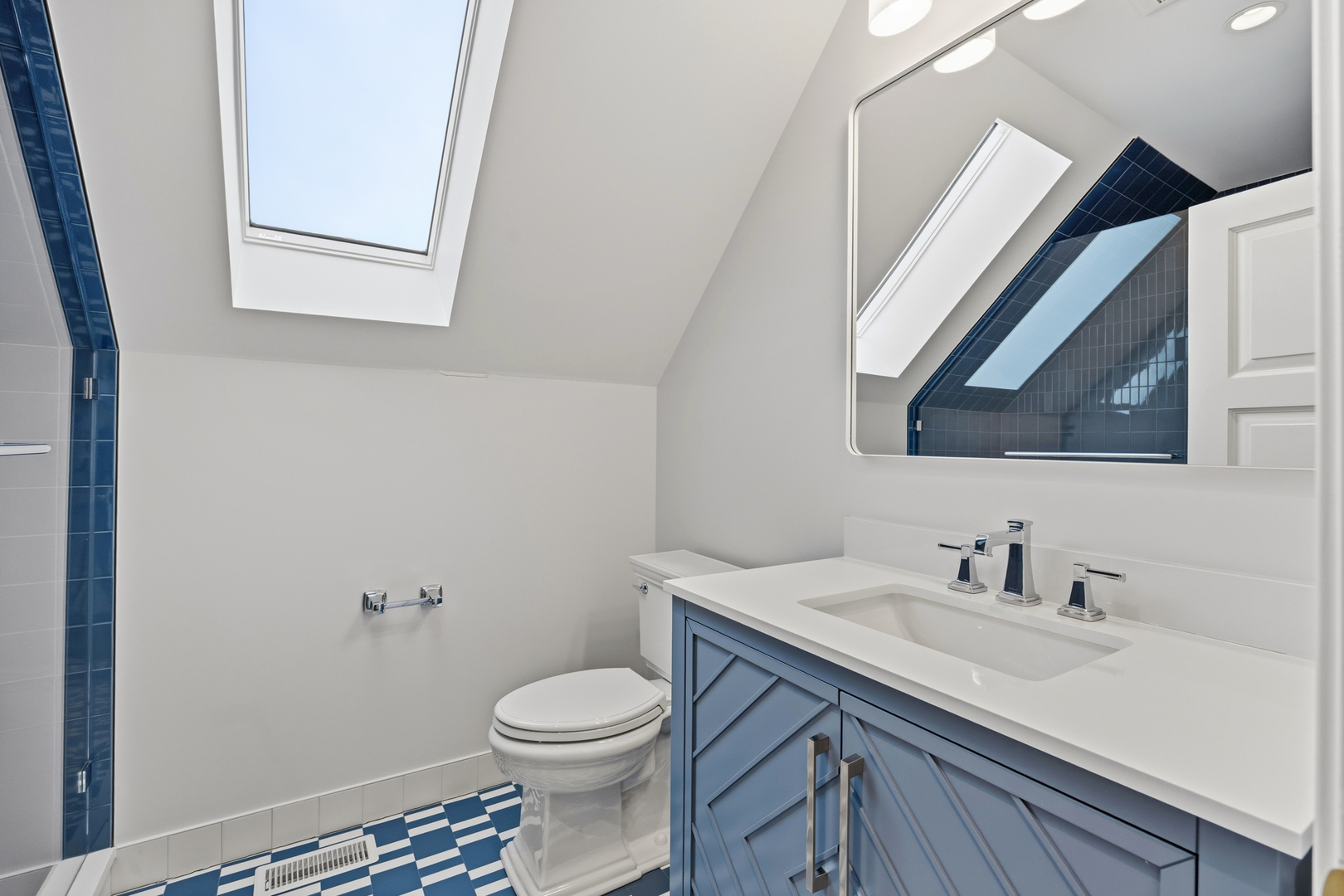 3902 North Hamilton Avenue Chicago, IL 60618 - Photo 59 of 67 a bathroom with a sink a toilet and mirror