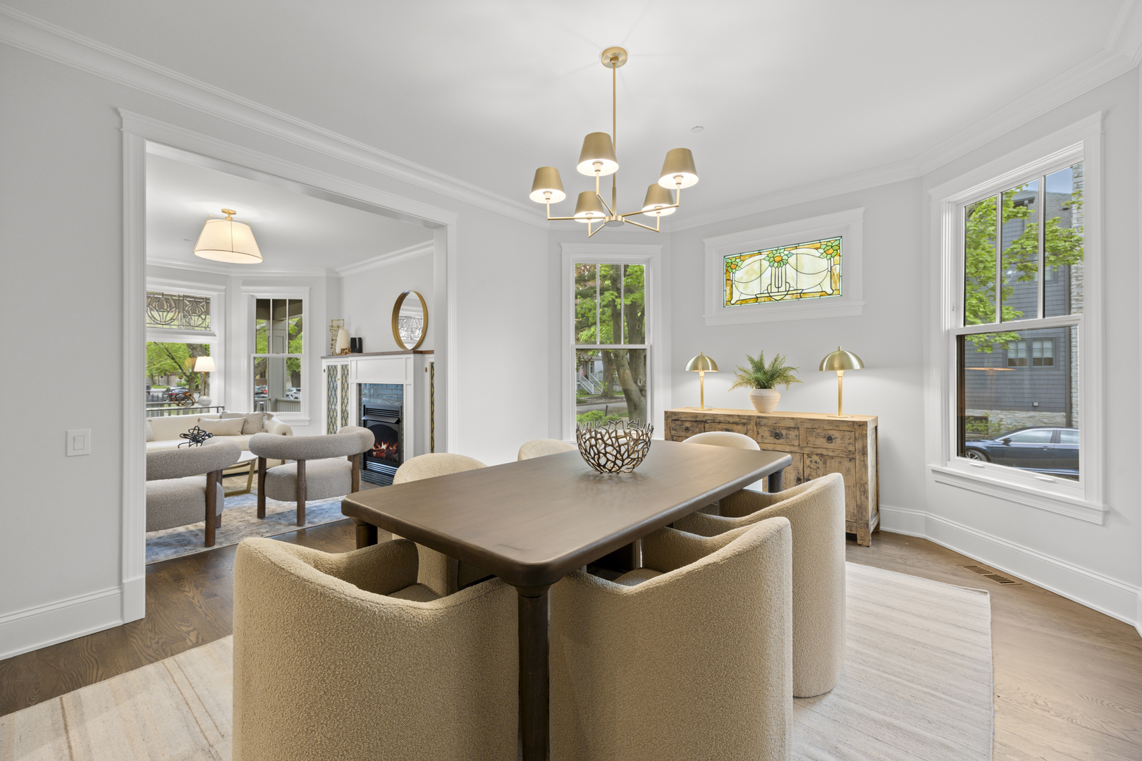 3902 North Hamilton Avenue Chicago, IL 60618 - Photo 10 of 67 a view of a dining room with furniture a chandelier and wooden floor