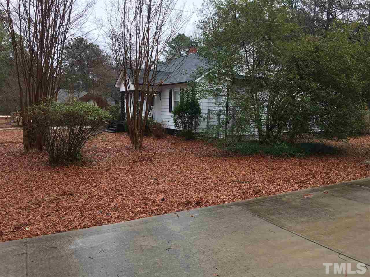 432 Raleigh View Road Raleigh, NC 27610 - Photo 3 of 3 a backyard of a house with lots of green space