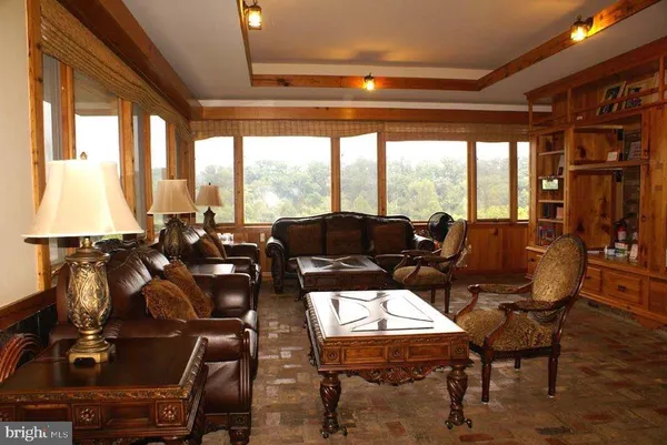 a room with gym equipment and a large window