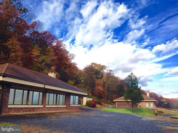 a view of a house with a big yard