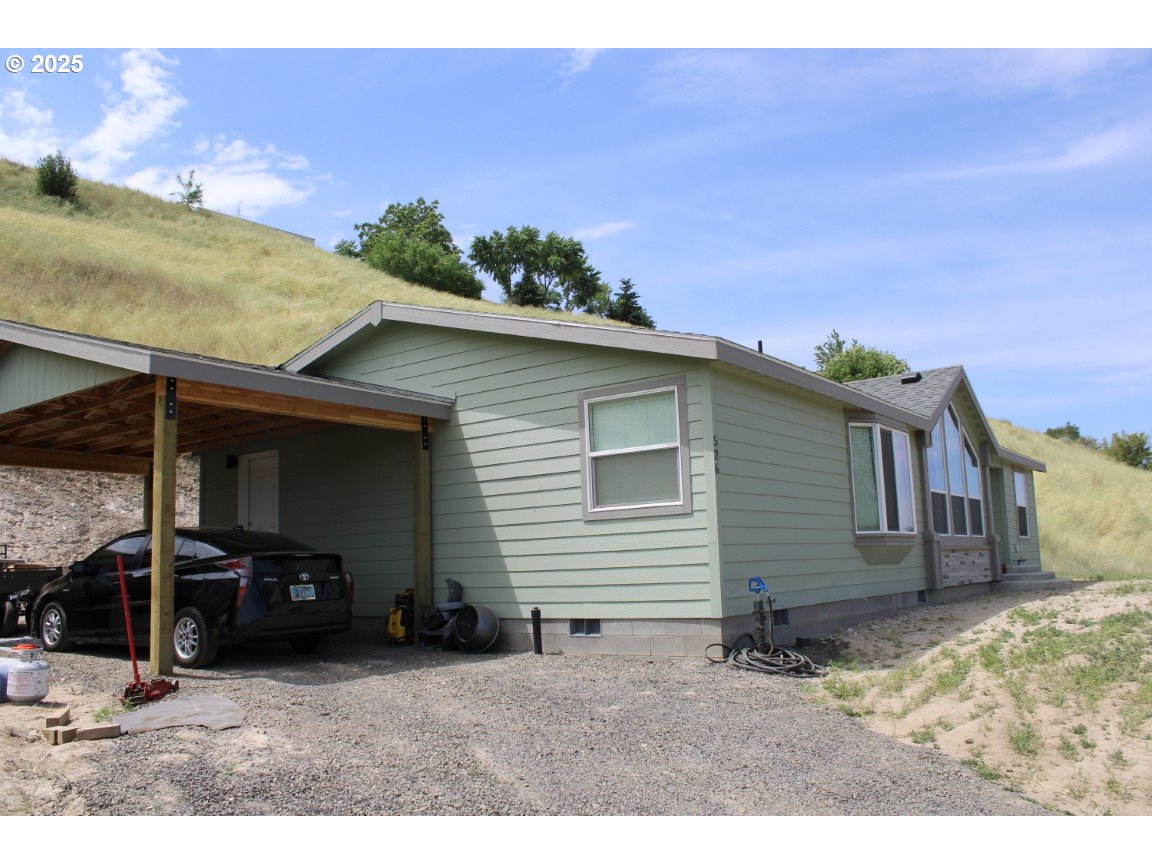 526 Southeast 15th Street Pendleton, OR 97801 - Photo 2 of 31 a view of a house with a backyard