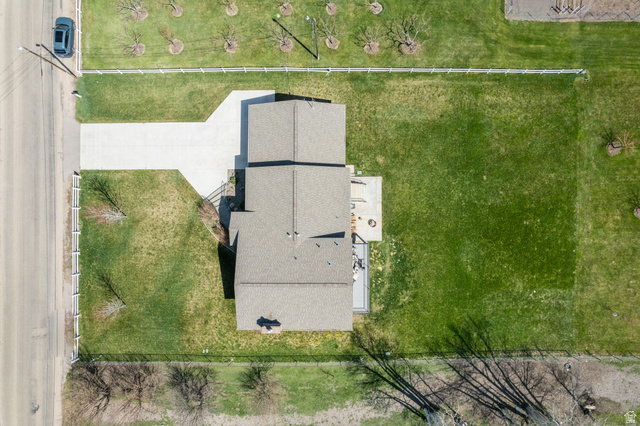 550 Pine Canyon Road Midway, UT 84049 - Photo 44 of 44 Expansive property featuring a multi-gabled roofline, concrete driveway, and a spacious green lawn