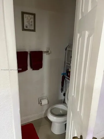 a table and chairs in front of a house