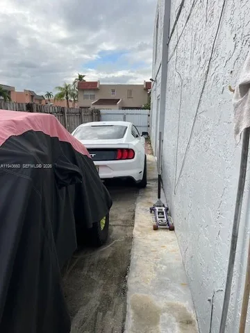 a view of a kitchen with a sink and a stove