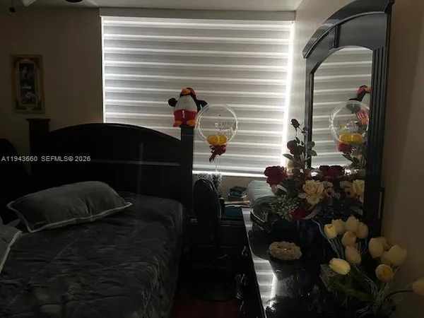 a view of a living room and dining room