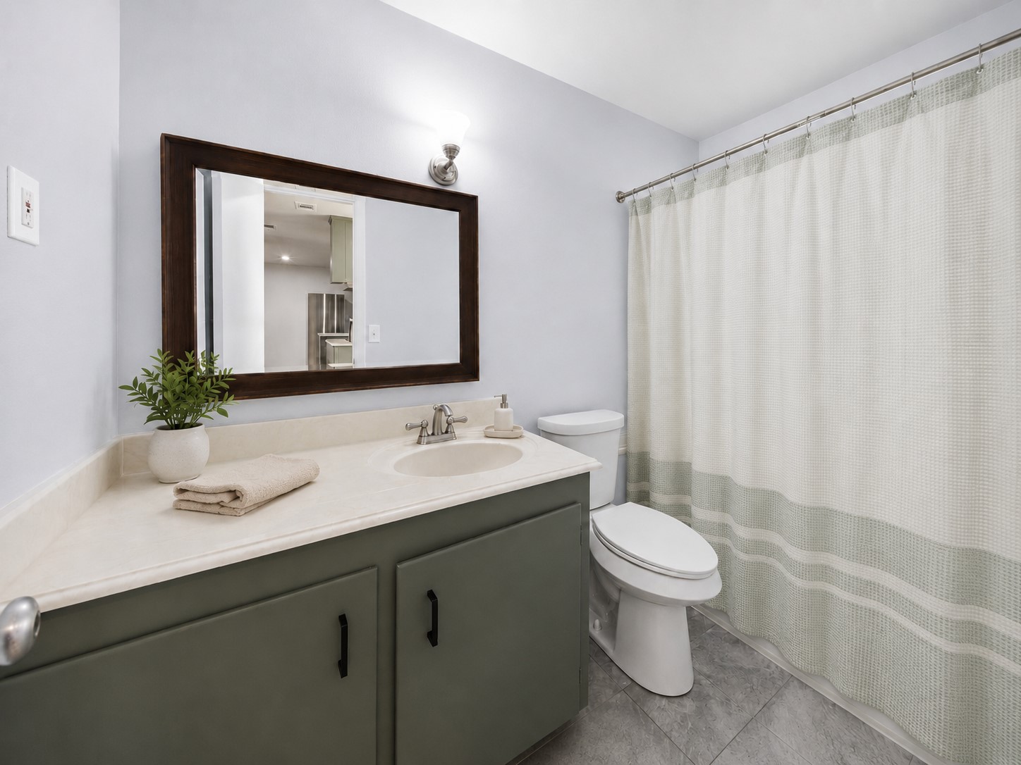 5443 Randon School Road Rosenberg, TX 77471 - Photo 16 of 20 Secondary bathroom with vanity, light countertop, tub/shower combo, window with blinds, and neutral wall finishes.