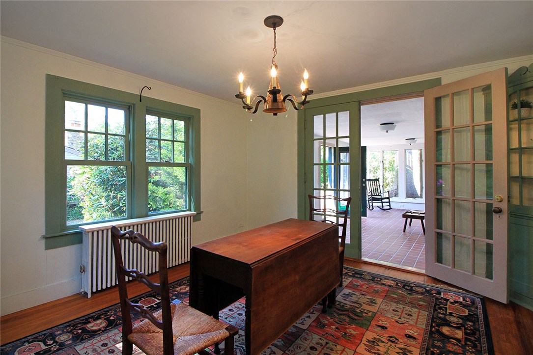 40 Wagner Road Westerly, RI 02891 - Photo 15 of 40 Large dining room with French doors & built-in Curio.