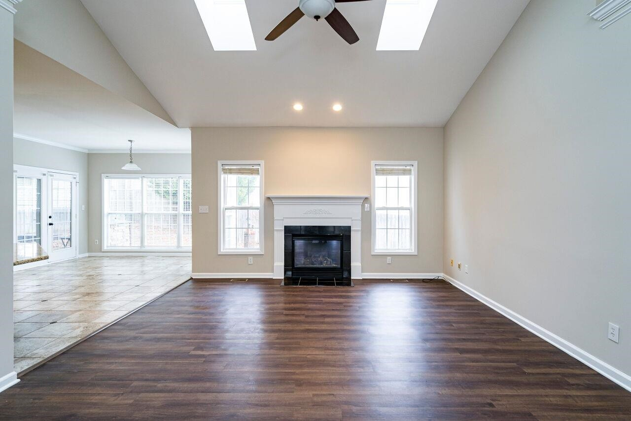 600 Three Meadows Road Fuquay-Varina, NC 27526 - Photo 7 of 30 Friends and family will enjoy spending time by the gas log fireplace. Family Room