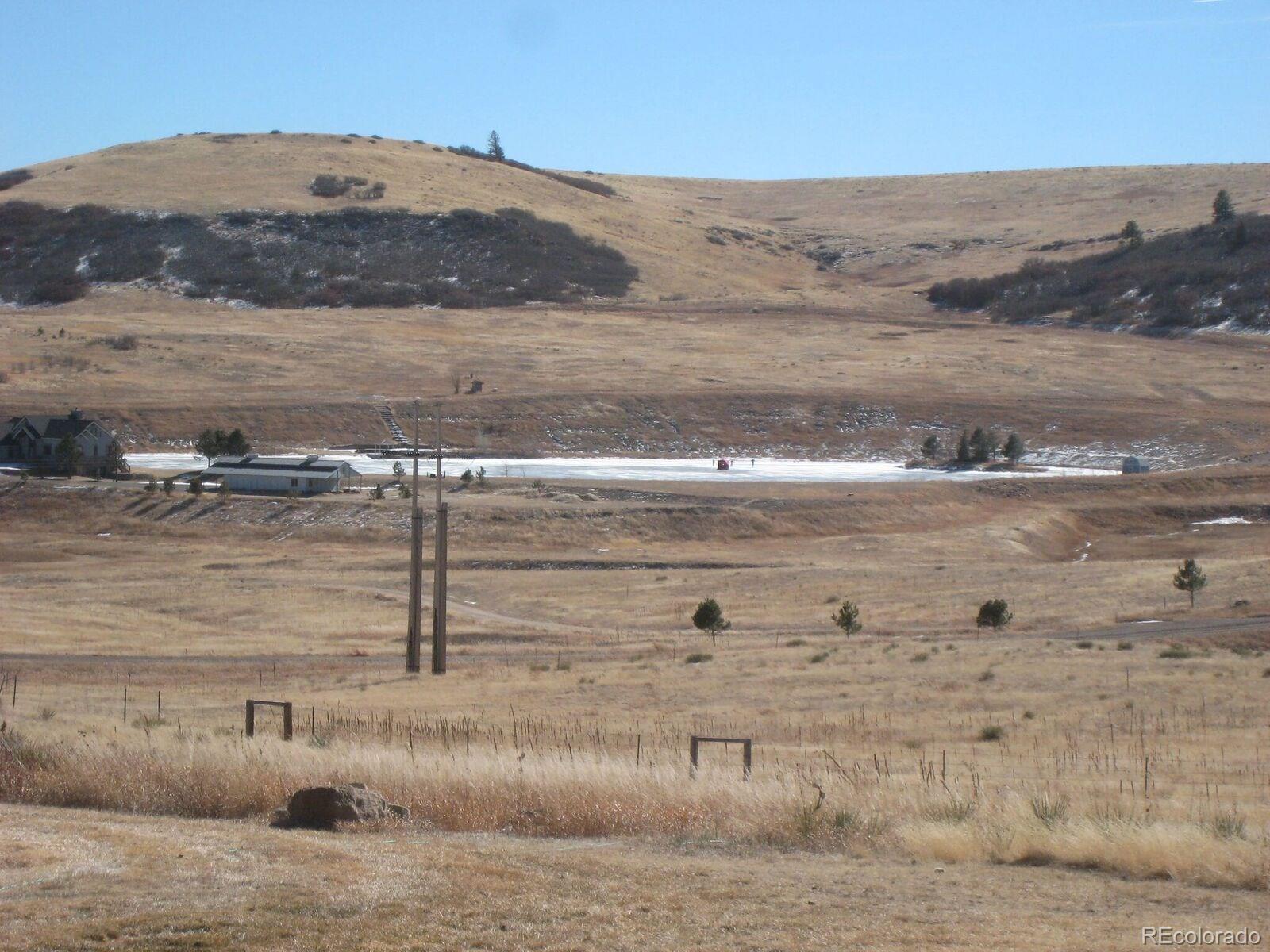 11940 South Spring Valley Road Franktown, CO 80116 - Photo 20 of 29 a view of ocean and mountain