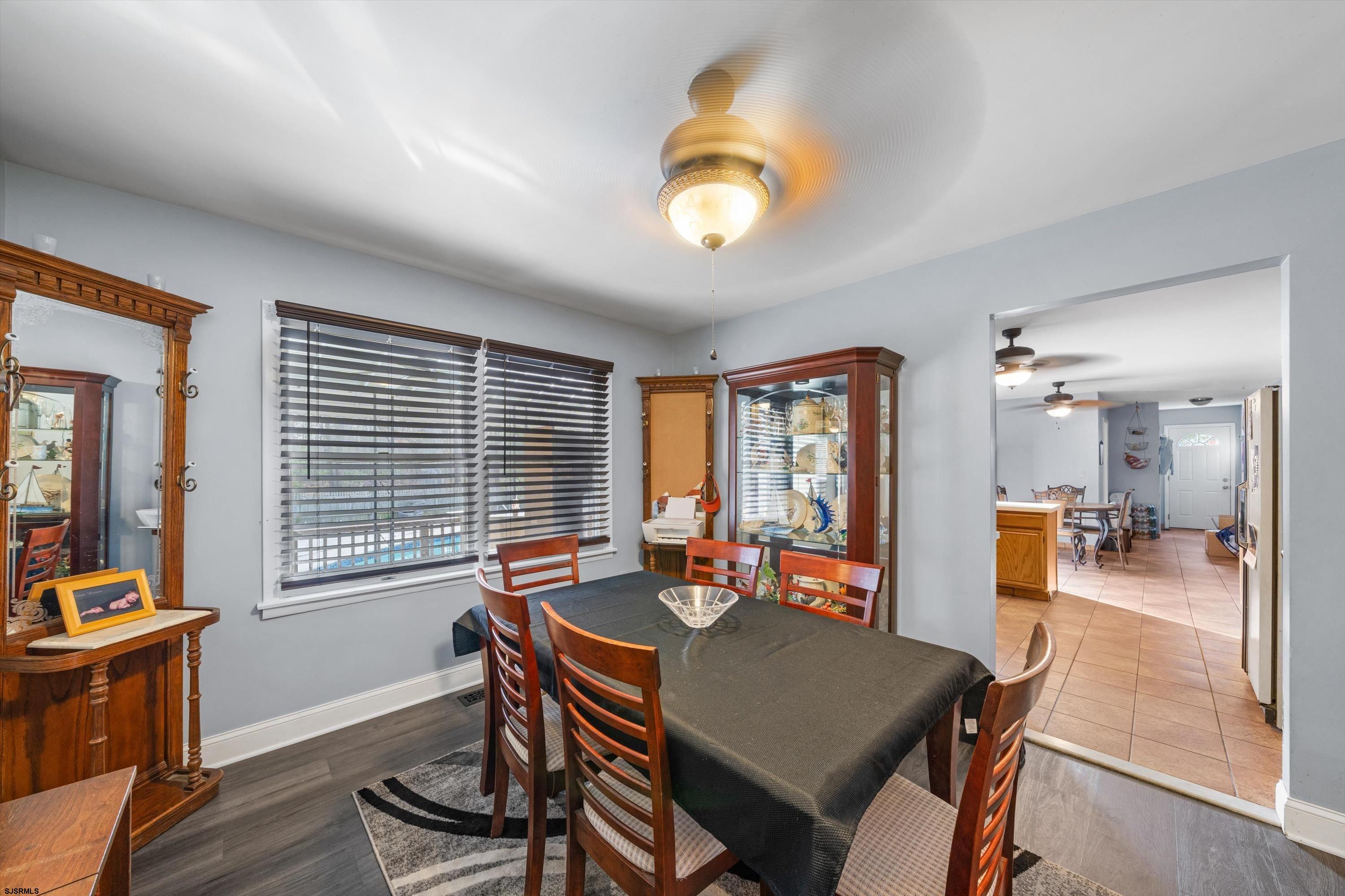 1319 Somers Point Road Egg Harbor Township, NJ 08234 - Photo 31 of 83 a view of a dining room with furniture and chandelier