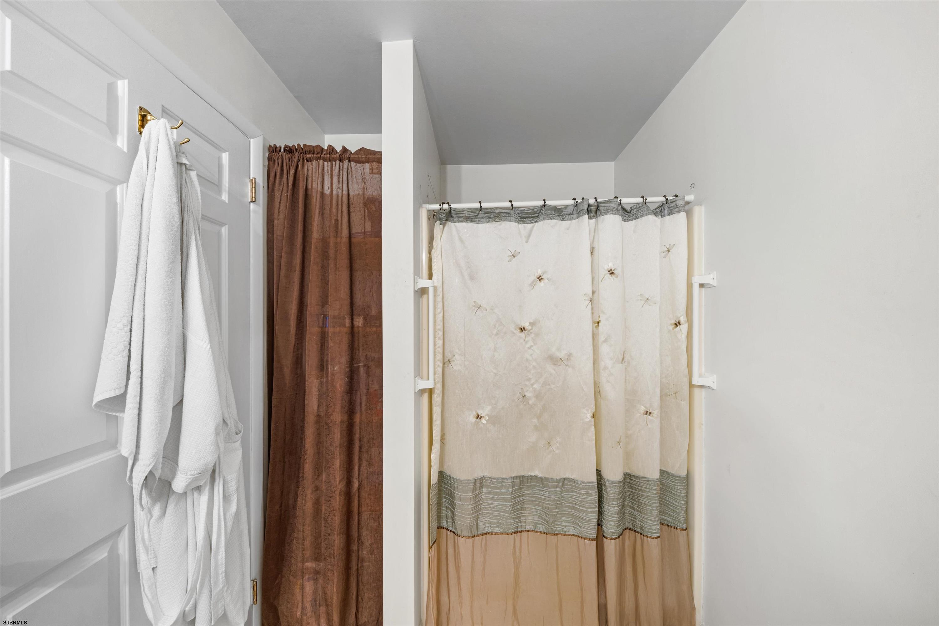1319 Somers Point Road Egg Harbor Township, NJ 08234 - Photo 53 of 83 a bathroom with a shower and a glass door