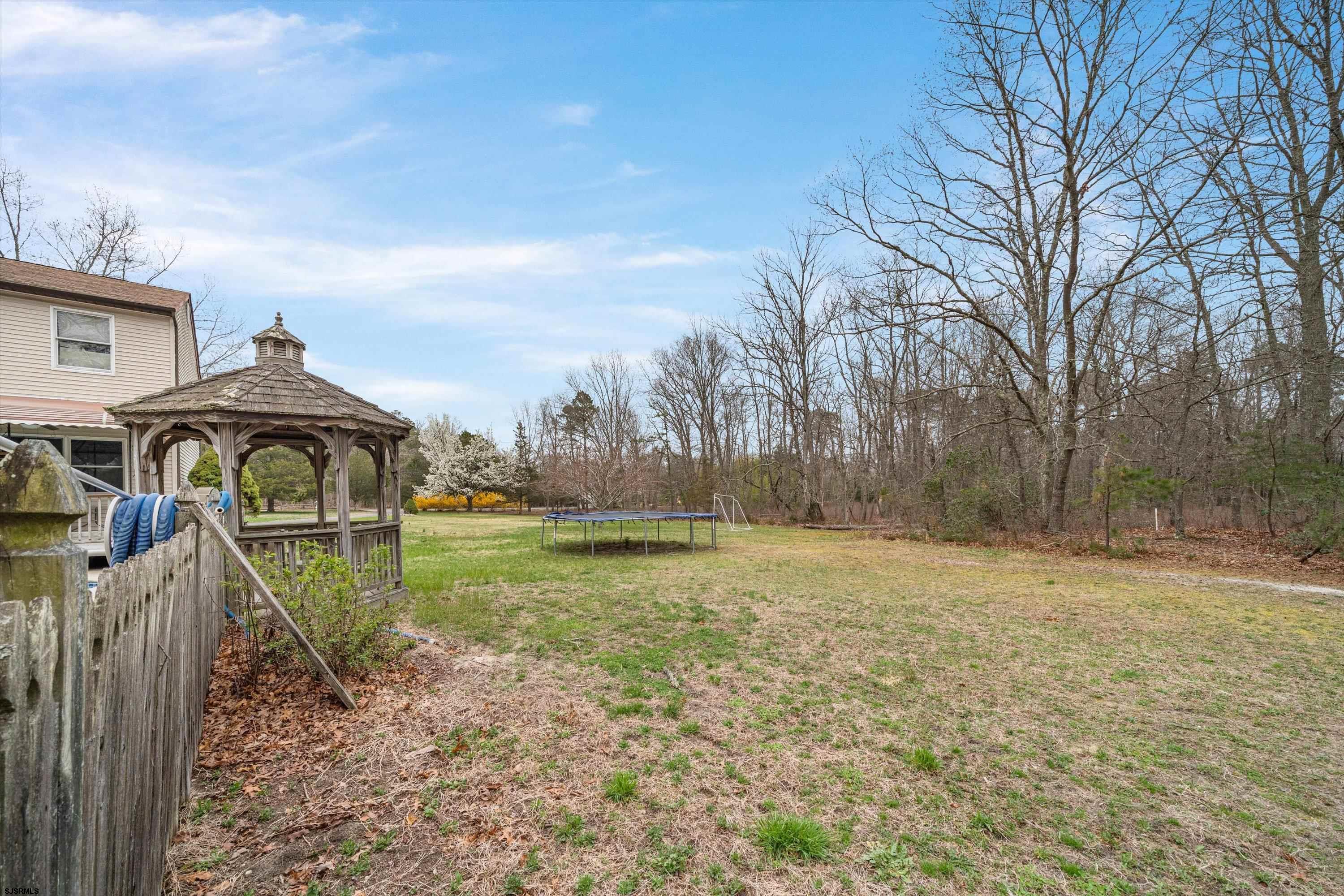 1319 Somers Point Road Egg Harbor Township, NJ 08234 - Photo 73 of 83 a view of a yard in front of a house