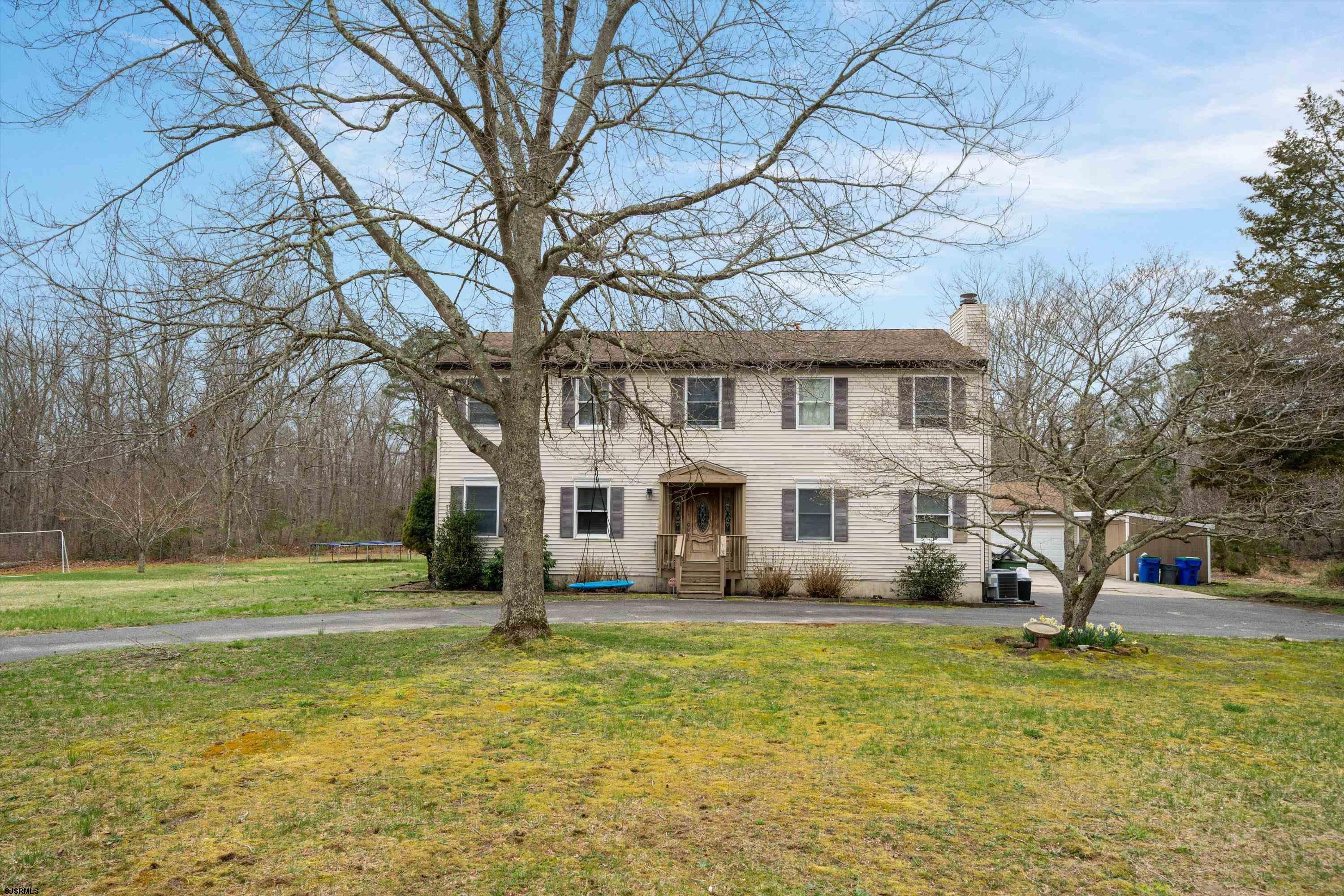 1319 Somers Point Road Egg Harbor Township, NJ 08234 - Photo 79 of 83 a front view of house with yard and green space