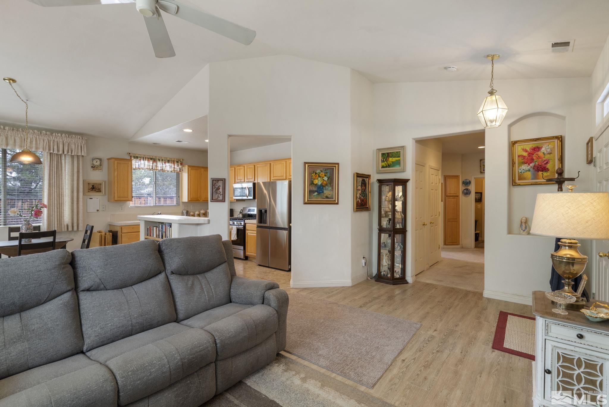 1620 Rocky Cove Lane Reno, NV 89521 - Photo 12 of 35 a living room with furniture and wooden floor