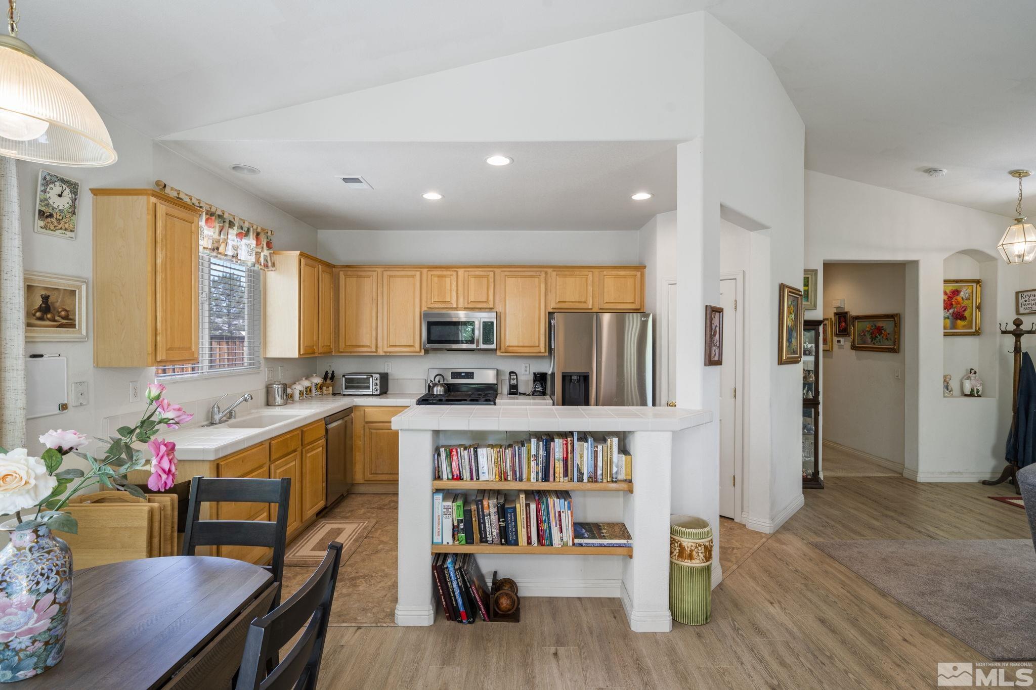 1620 Rocky Cove Lane Reno, NV 89521 - Photo 14 of 35 a large kitchen with lots of counter space and refrigerator