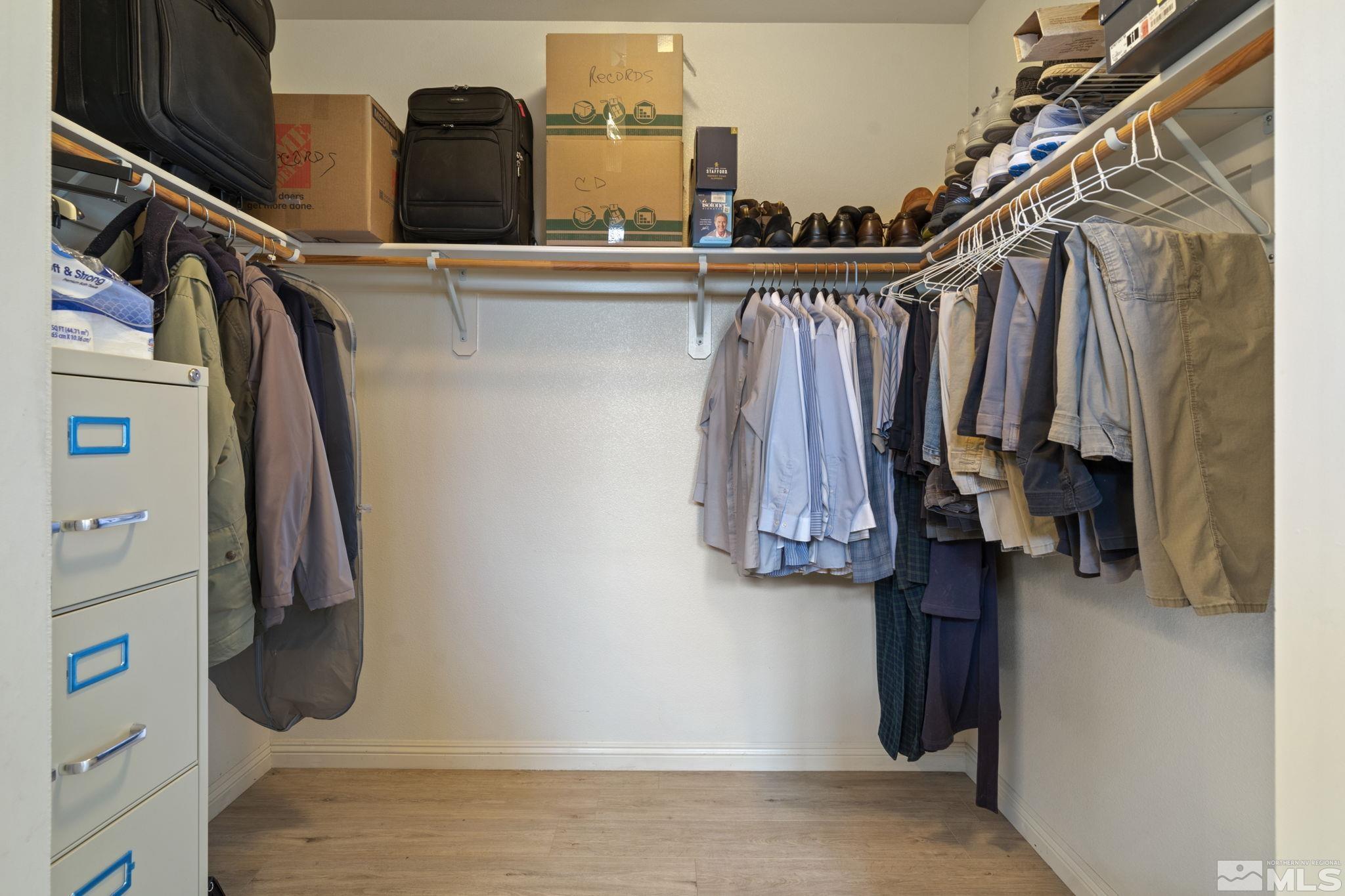 1620 Rocky Cove Lane Reno, NV 89521 - Photo 27 of 35 a view of walk in closet with clothes and shoes