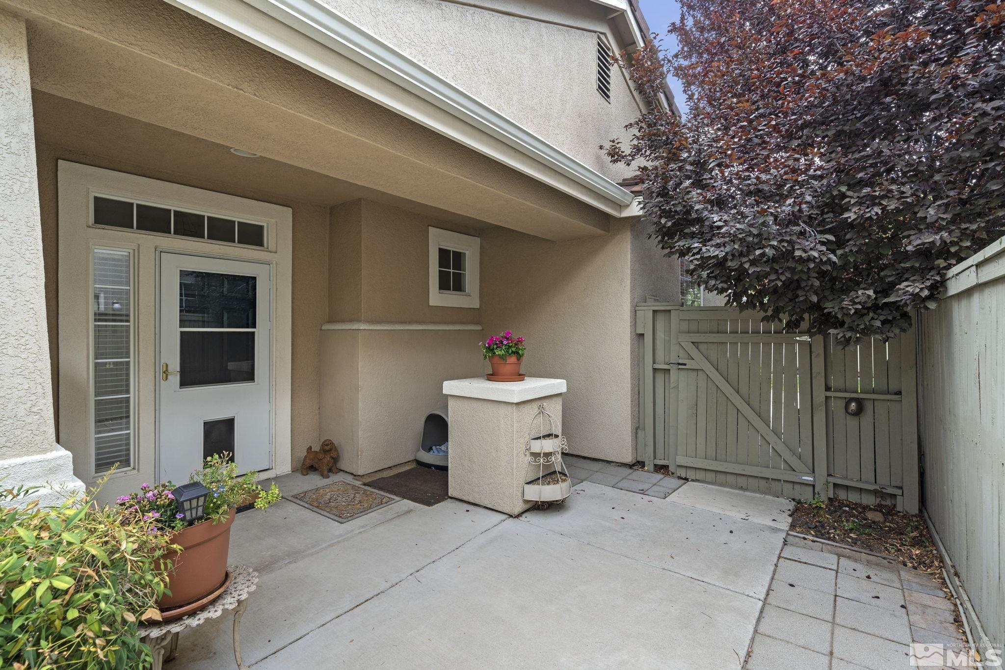 1620 Rocky Cove Lane Reno, NV 89521 - Photo 5 of 35 a white house with yard in front of it