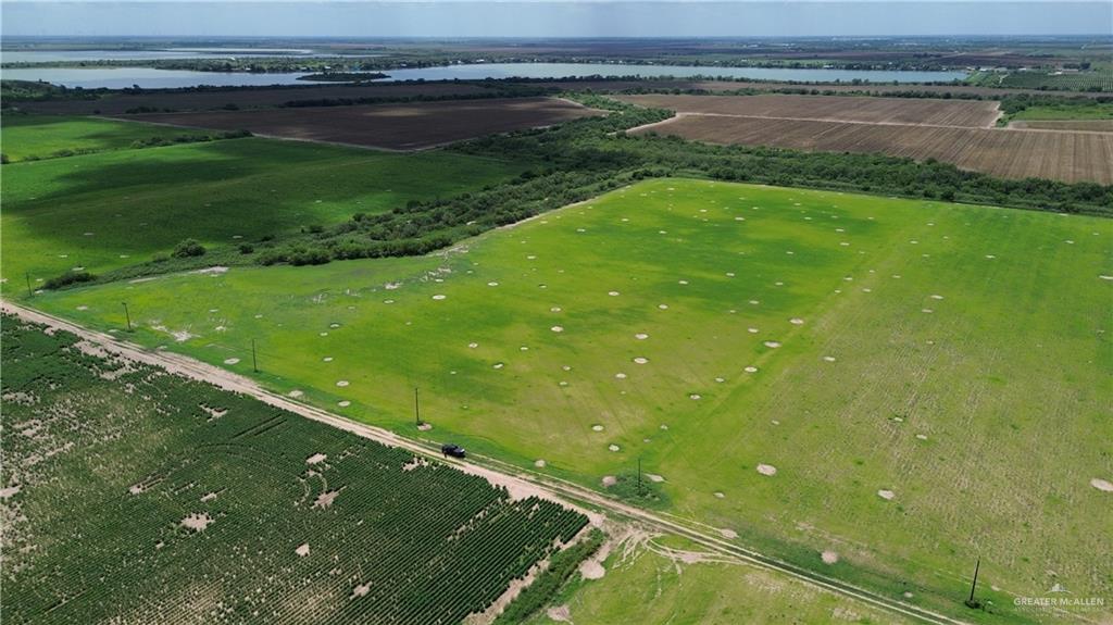 3-4 Filegonia Road Edcouch, TX 78538 - Photo 4 of 7 a view of a lake from a yard