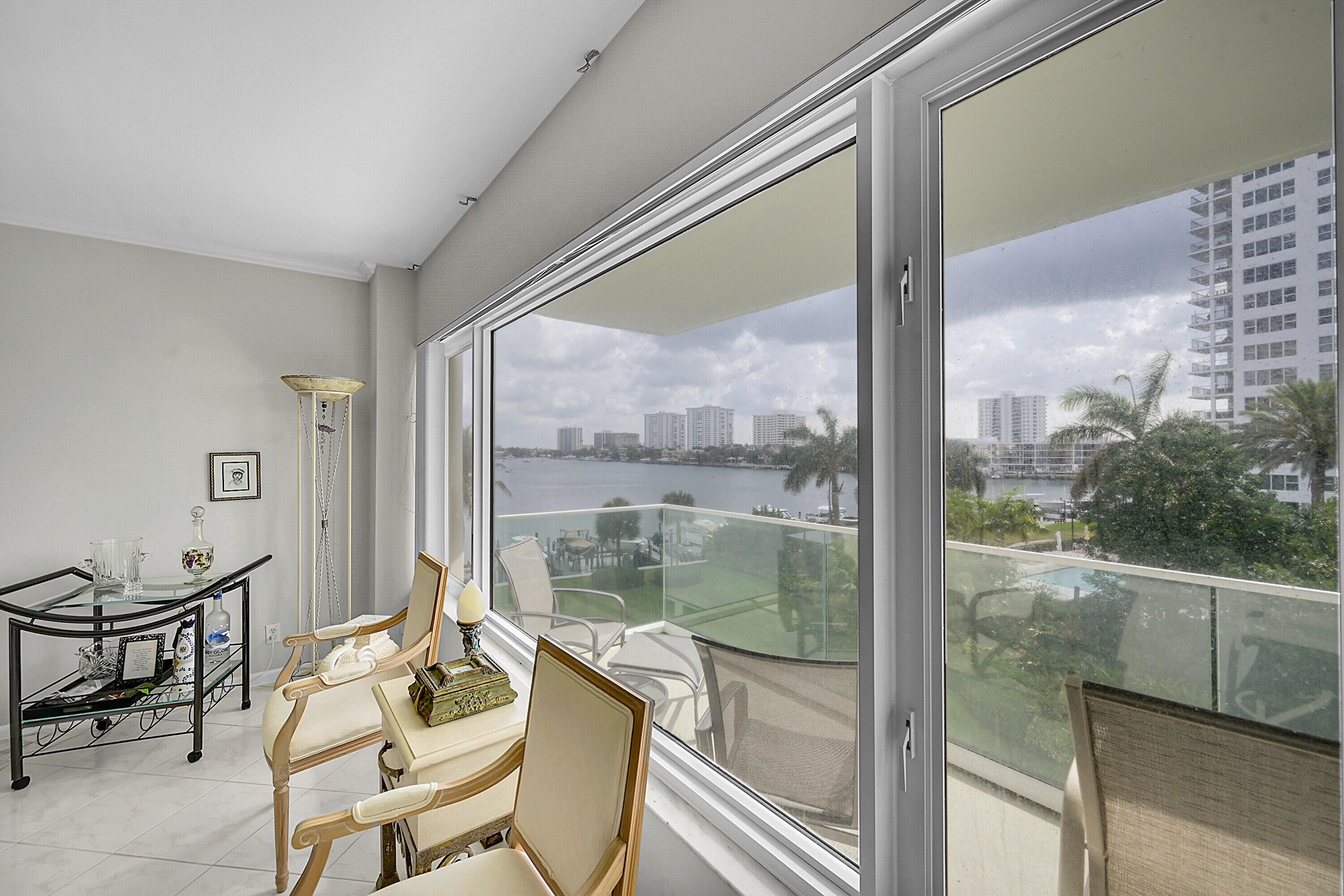 701 East Camino Real, Unit 4B Boca Raton, FL 33432 - Photo 12 of 35 a view of a room with a large window and furniture