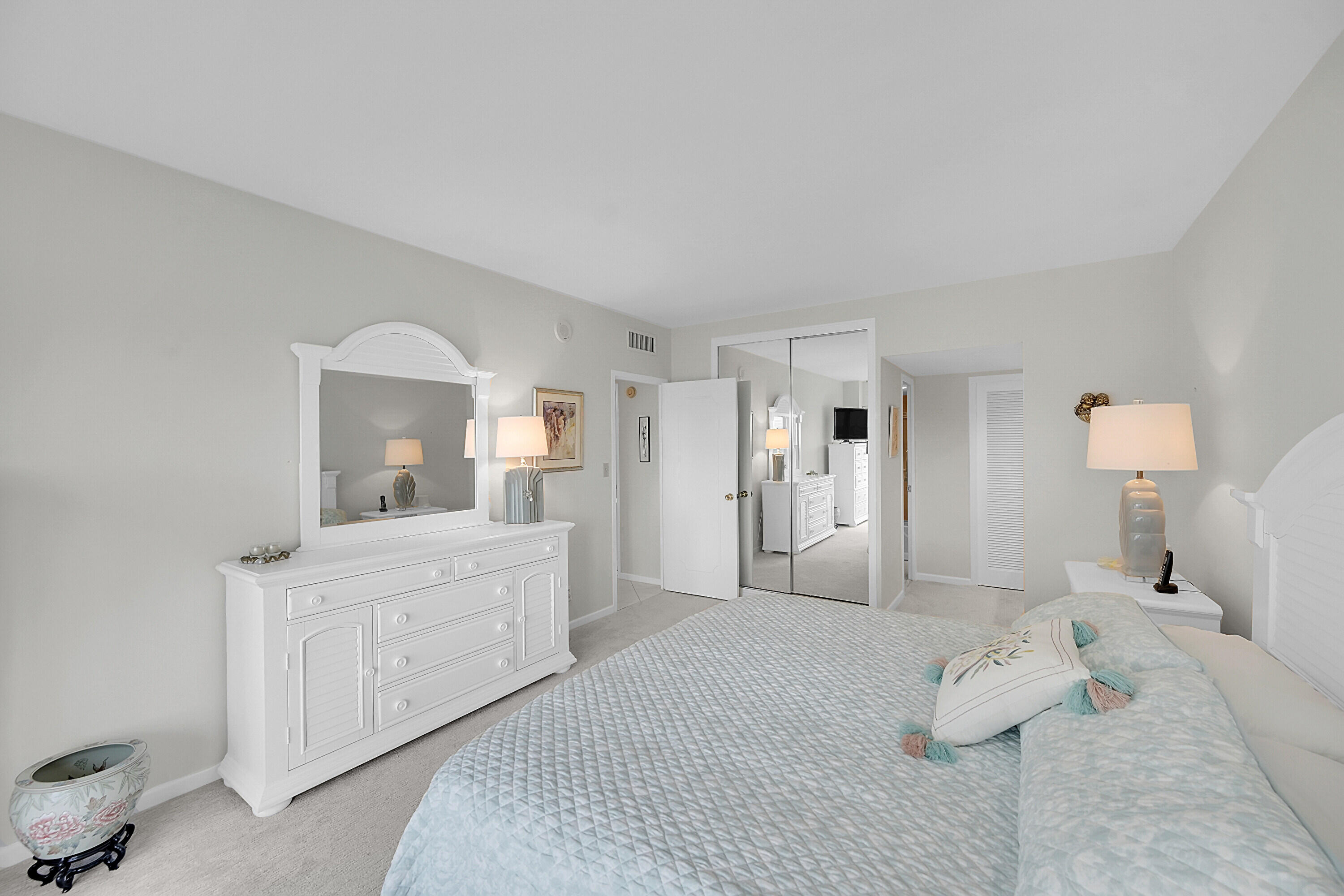 701 East Camino Real, Unit 4B Boca Raton, FL 33432 - Photo 20 of 35 a large white bed in a white room