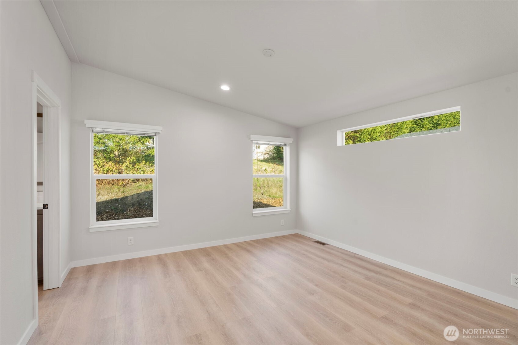 177 Sunset Meadows Lane Port Hadlock, WA 98339 - Photo 13 of 20 an empty room with windows