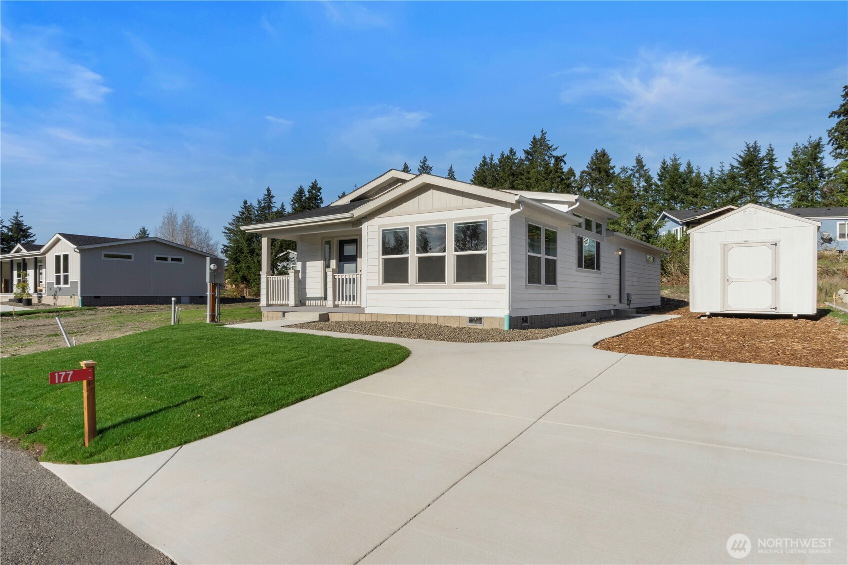 177 Sunset Meadows Lane Port Hadlock, WA 98339 - Photo 3 of 20 a front view of a house with a garden