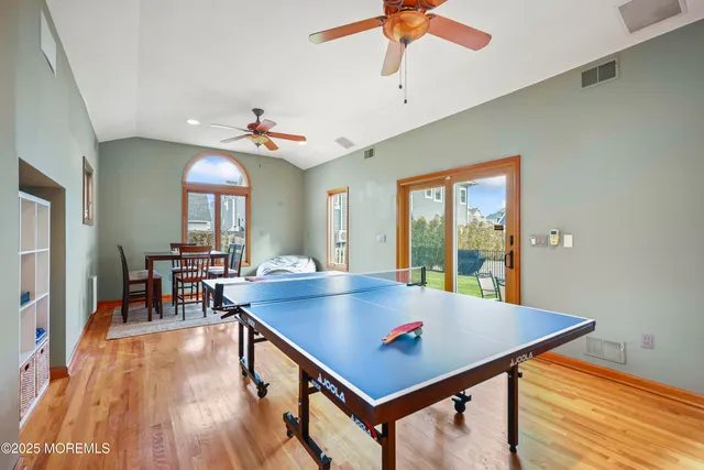 a view of a livingroom with furniture and wooden floor