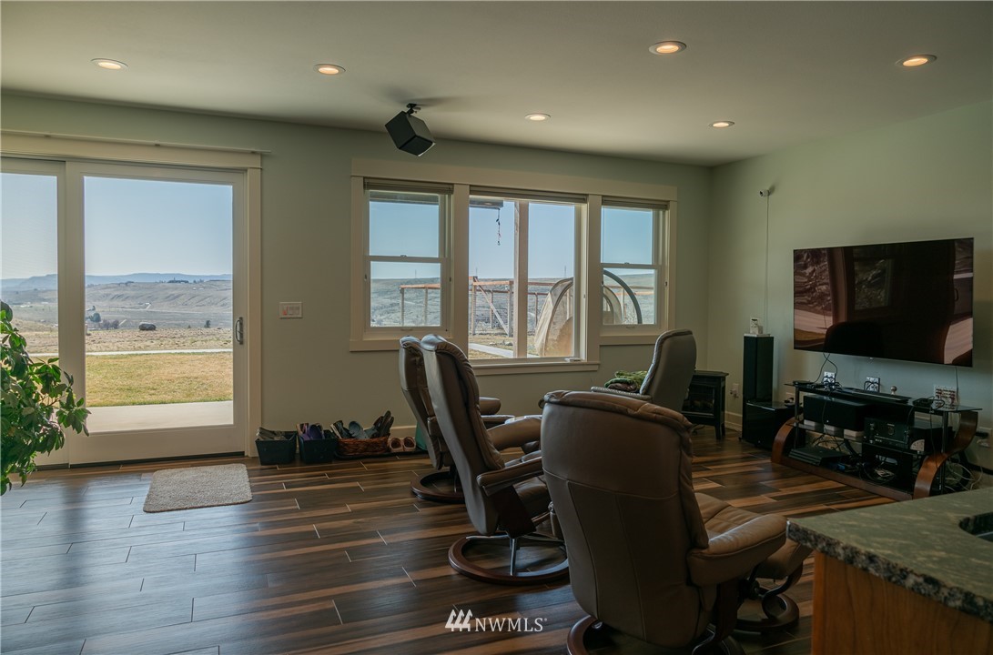 70 B Tunk Creek Road Riverside, WA 98849 - Photo 25 of 40 a view of a workspace with furniture and a window