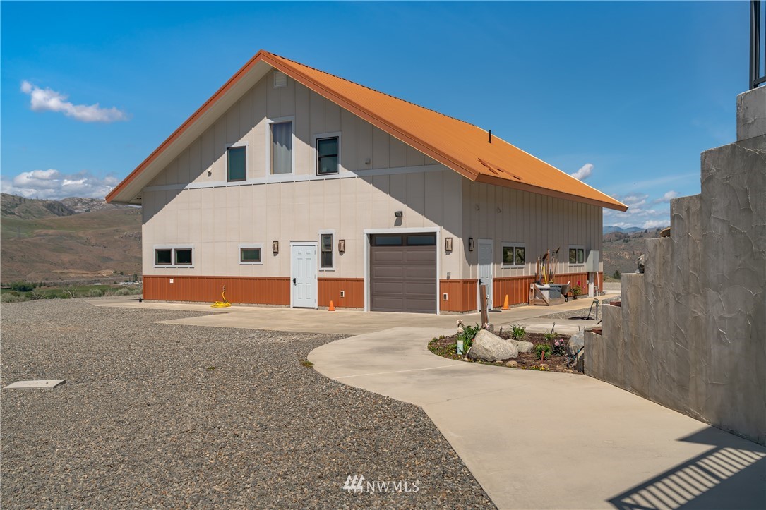 70 B Tunk Creek Road Riverside, WA 98849 - Photo 40 of 40 a front view of a house with a yard
