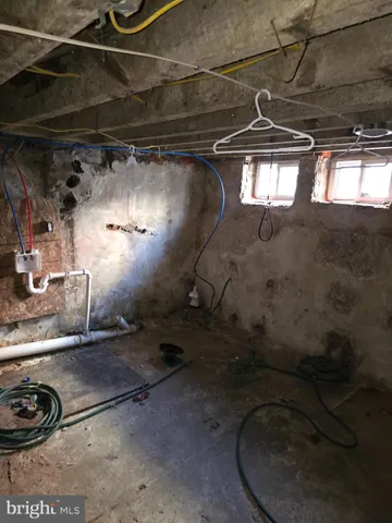 a view of a room with wooden walls