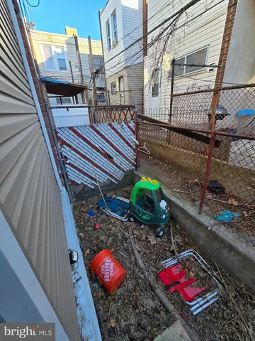 a view of entryway with wooden stairs