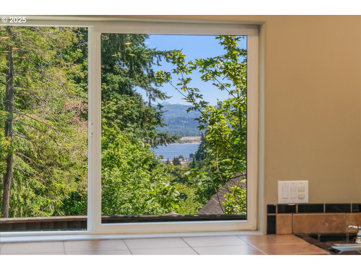 30062 Maple Drive Rainier, OR 97048 - Photo 12 of 47 a view of a garden from a window