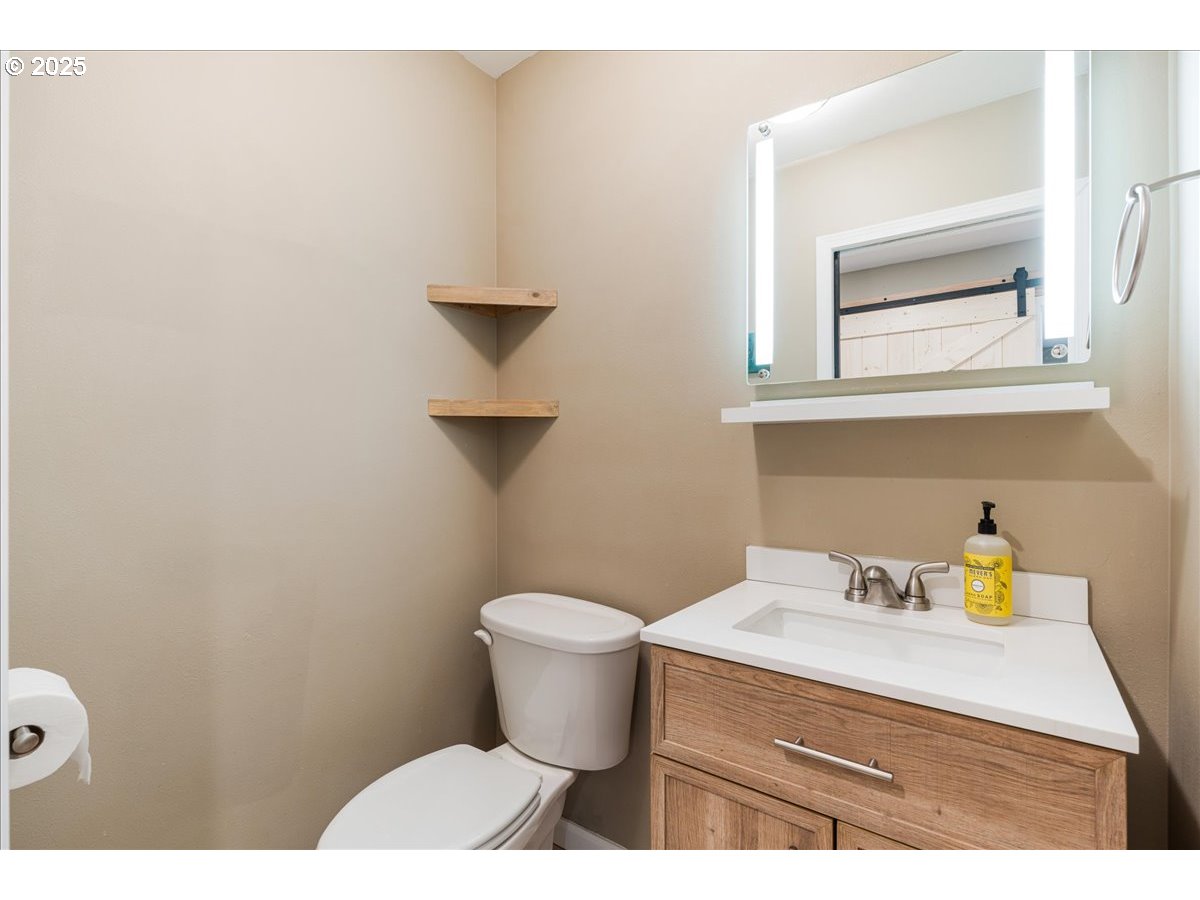 30062 Maple Drive Rainier, OR 97048 - Photo 27 of 47 a bathroom with a sink and a toilet
