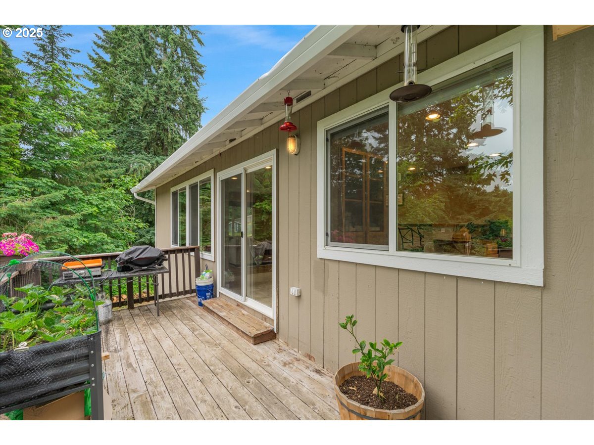 30062 Maple Drive Rainier, OR 97048 - Photo 35 of 47 a view of backyard with deck and outdoor seating