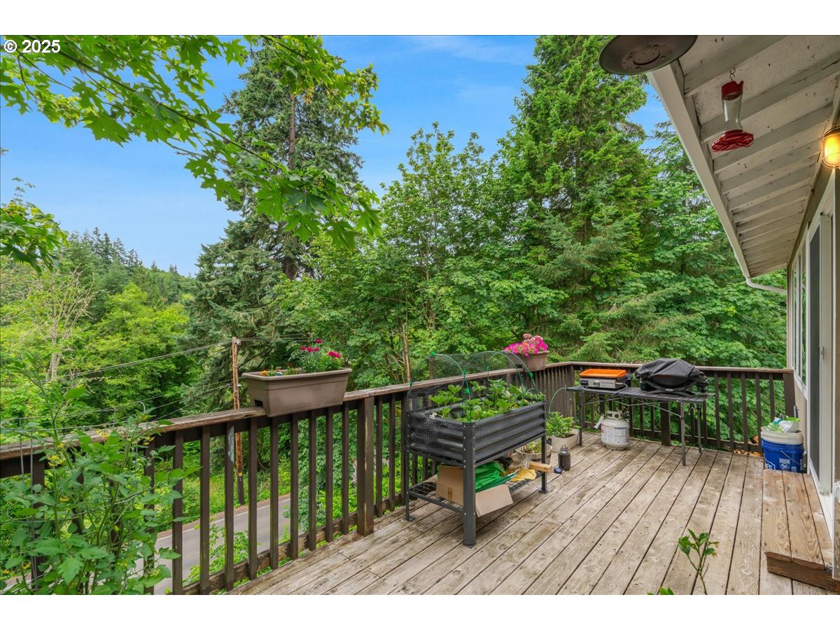 30062 Maple Drive Rainier, OR 97048 - Photo 36 of 47 a view of a chairs and table on the wooden deck