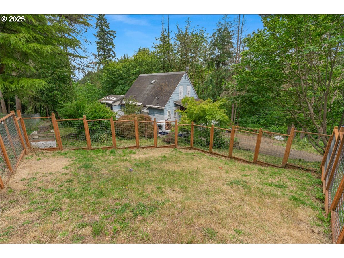 30062 Maple Drive Rainier, OR 97048 - Photo 38 of 47 a backyard of a house with lots of green space