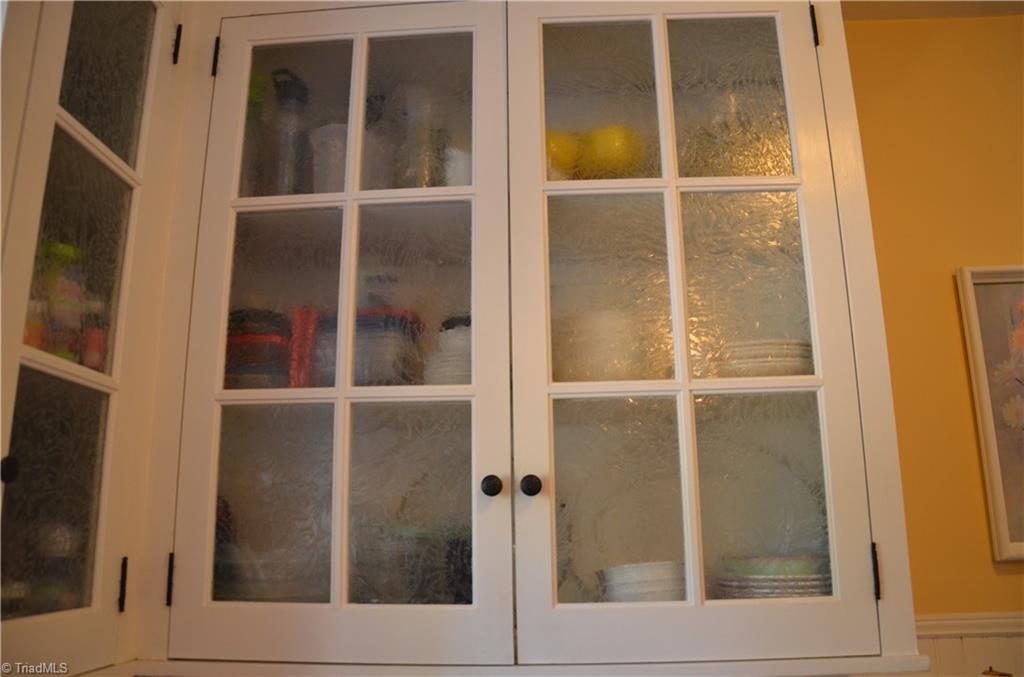 Beautiful Glass front Cabinets In Kitchen
