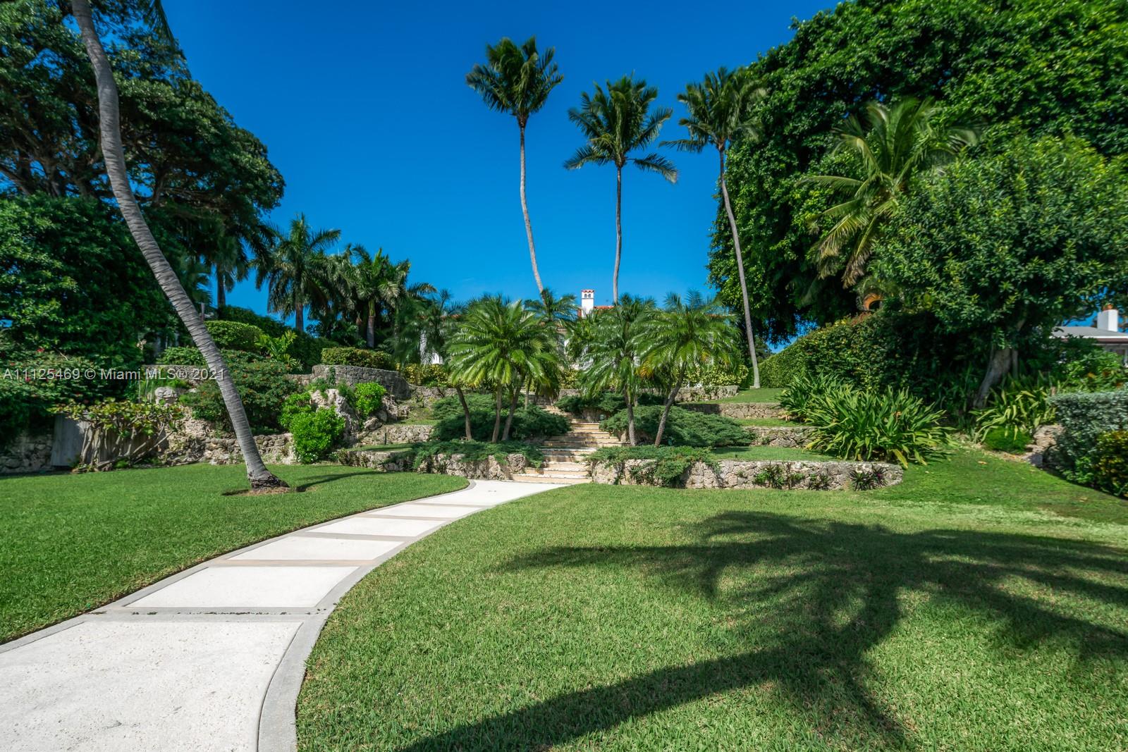 3029 Brickell Avenue Miami, FL 33133 - Photo 16 of 41 a view of a garden with a tree
