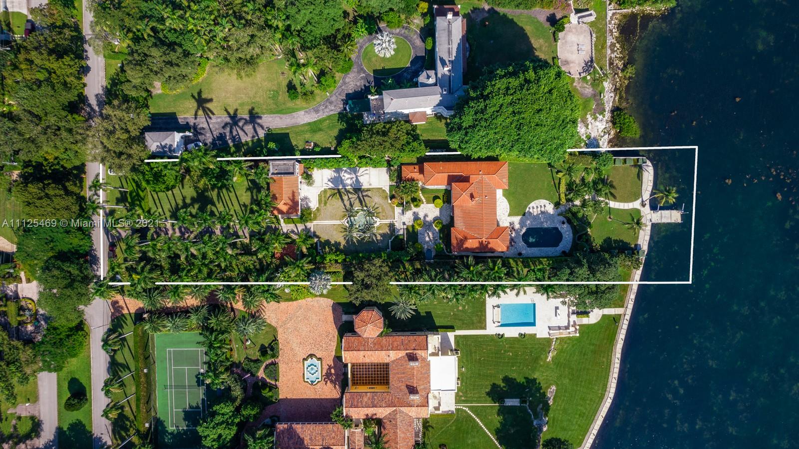 3029 Brickell Avenue Miami, FL 33133 - Photo 21 of 41 an aerial view of a house with swimming pool outdoor seating and yard